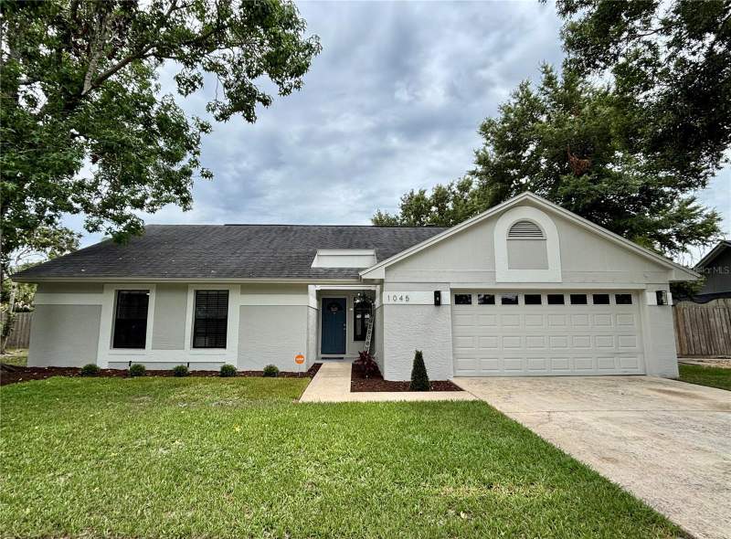 4 bedroom Single Family Residence at 1045 SHAFFER TRAIL, ALAFAYA WOODS PH 1 - UNIT A, OVIEDO — photo 1