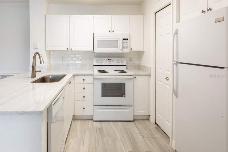 2 bedroom Condominium at 4209 Woodstorks Walk Way #1110, Lakeview At Calusa Trace, Lutz — photo 5
