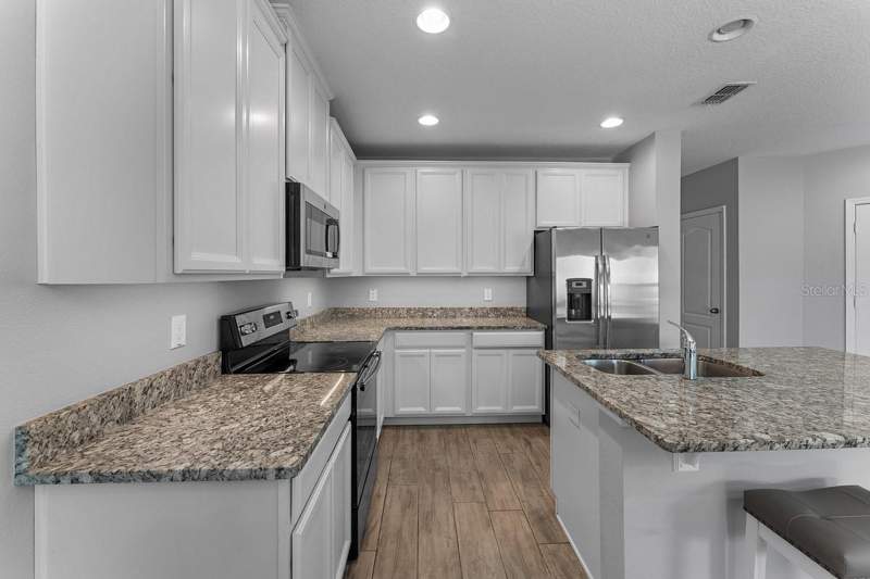 4 bedroom Townhouse at 1037 FLOWING TIDE DRIVE, TOWNS/AVALON RDG, ORLANDO — photo 4