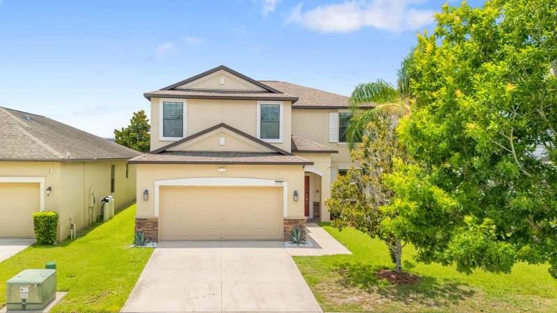 6 bedroom Single Family Residence at 13216 Wellington Hills Drive, Summerfield Crossings Village 2 Tr, Riverview — photo 2