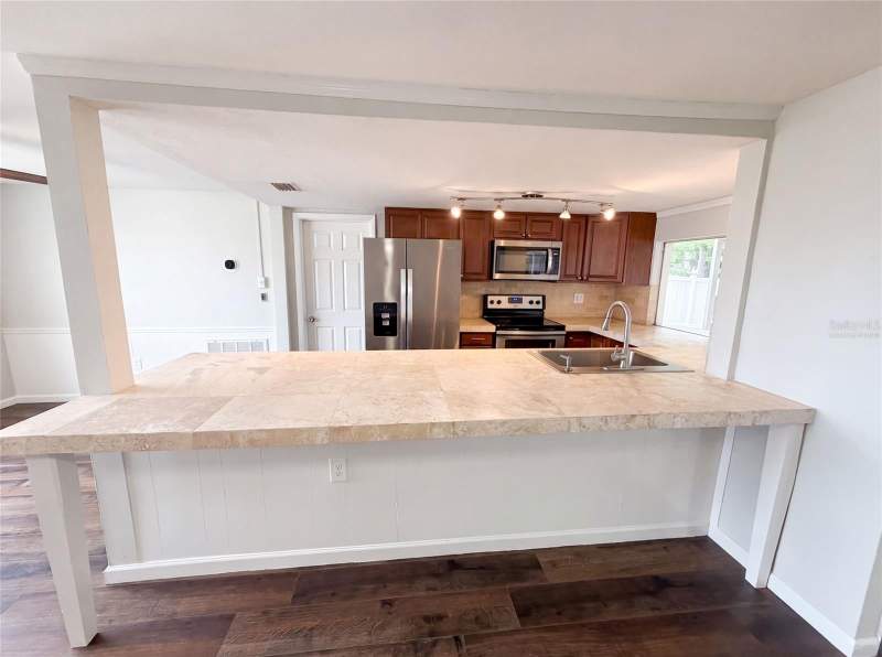 2 bedroom Single Family Residence at 3400 Bainbridge Drive, Beacon Square, Holiday — photo 2