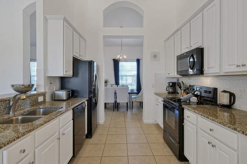 4 bedroom Single Family Residence at 4095 Oaktree Drive, Oakmont Ph 01, Davenport — photo 2