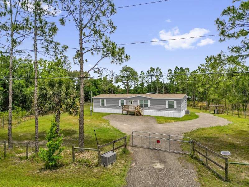 4 bedroom Manufactured Home at 9165 LUNA DRIVE, CANAVERAL ACRES 1, ST CLOUD — photo 1