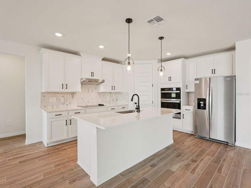 4 bedroom Single Family Residence at 10842 Budding Blossom Court, Oakfield Trails, Parrish — photo 3