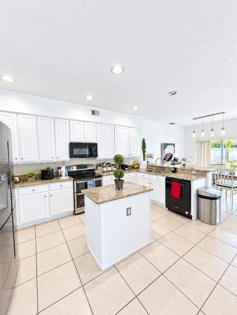 5 bedroom Single Family Residence at 1349 Castleport Road, Stoneybrook West 44/134, Winter Garden — photo 5