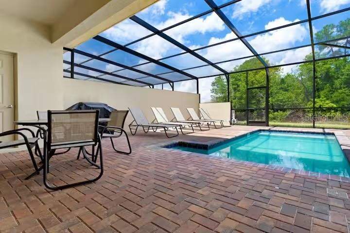 5 bedroom Townhouse at 8887 Geneve Court, Windsor At Westside Ph 2B, Kissimmee — photo 3