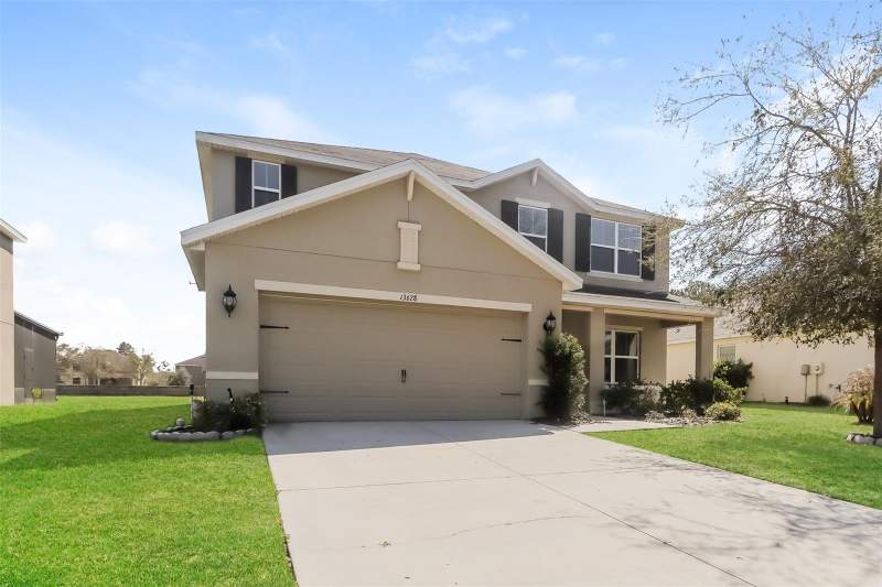5 bedroom Single Family Residence at 13628 Covey Run Place, Sterling Hill Ph 2A, Spring Hill — photo 2