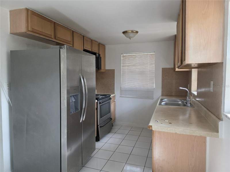 4 bedroom Half Duplex at 1212 E Chilkoot Avenue, Nebraska Ave Heights, Tampa — photo 3