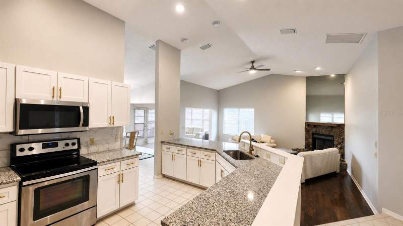 2 bedroom Single Family Residence at 13036 Topflite Court, Wood View At Meadow Oaks, Hudson — photo 5