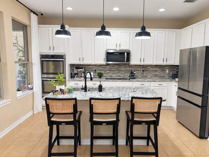 4 bedroom Single Family Residence at 1119 Fountain Coin Loop, Reserve/Golden Isle, Orlando — photo 5