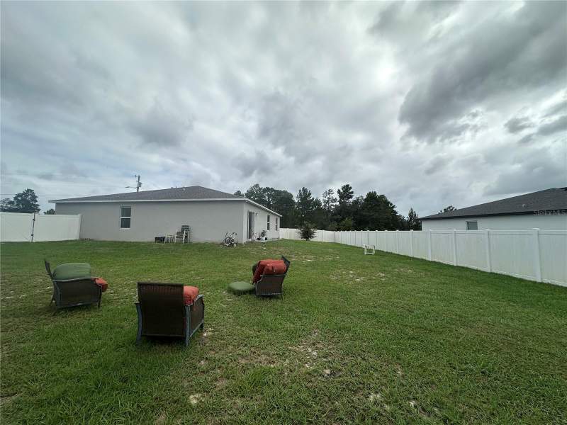 4 bedroom Single Family Residence at 80 Zinnia Lane, Poinciana Nbrhd 02 Village 08, Poinciana — photo 2