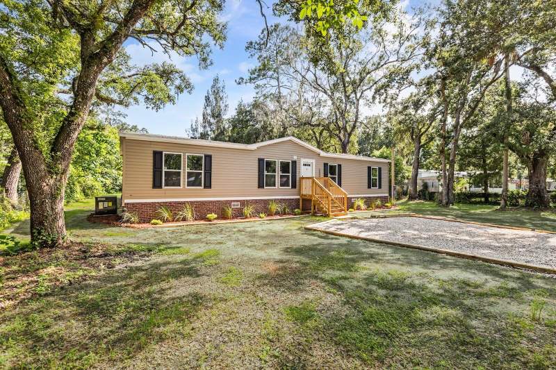 4 bedroom Manufactured Home at 25046 CELESTIAL STREET, CHRISTMAS PARK FIRST ADD, CHRISTMAS — photo 2
