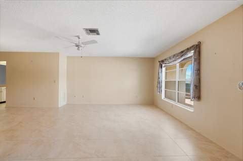 1027 Bluewater Drive, Sun City Center FL - photo 6 of 42