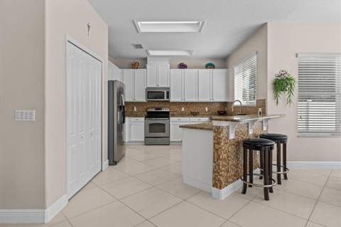 12955 Moss Park Ridge Drive, Orlando FL - photo 11 of 43
