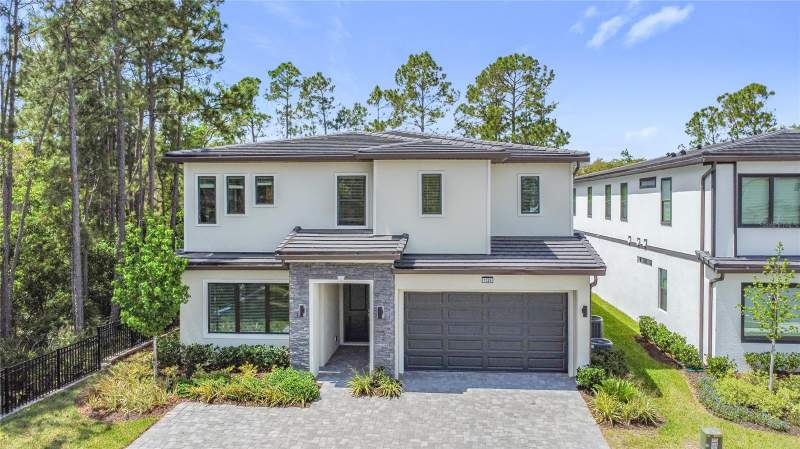 12 bedroom Single Family Residence at 1326 BUTTERFLY ORCHID ROAD, WATERSONG PH TWO, DAVENPORT — photo 1