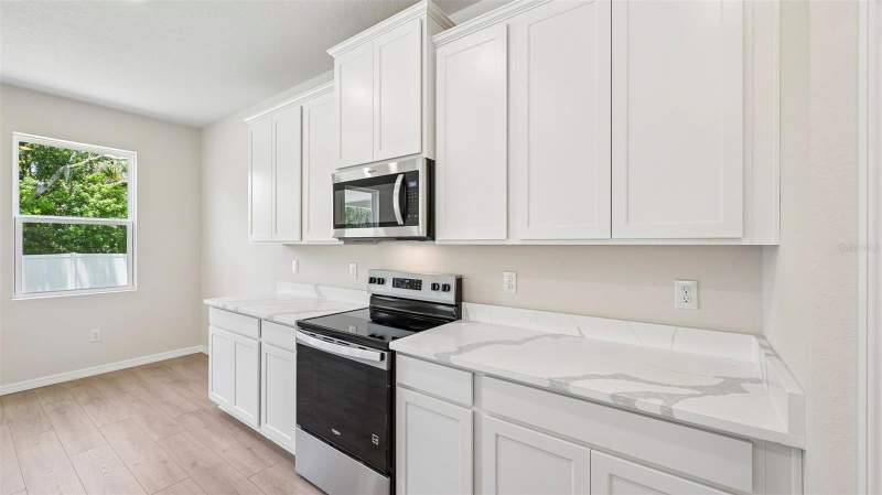 5 bedroom Single Family Residence at 10437 Woodland Garden Way, Oakfield Trails, Parrish — photo 5