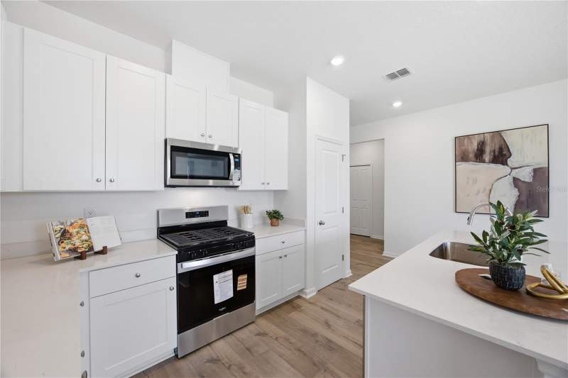 4 bedroom Single Family Residence at 5731 Hiawassee Road, Heritage-The Cottages Of Sanders Grove, Okahumpka — photo 4