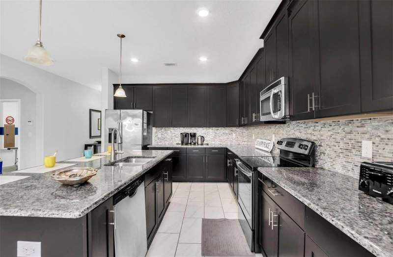 6 bedroom Single Family Residence at 5504 Solterra Circle, Solterra Ph 1, Davenport — photo 3