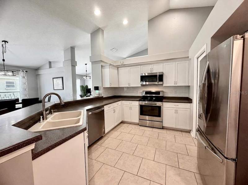 4 bedroom Single Family Residence at 13449 Meadow Golf Avenue, Meadow Oaks, Hudson — photo 4
