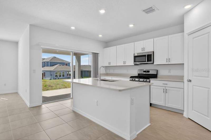 4 bedroom Single Family Residence at 217 Streamwater Way, Waterstone, Groveland — photo 5