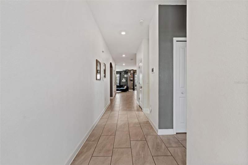 6 bedroom Single Family Residence at 8983 Backswing Way, Stoneybrook South, Davenport — photo 4
