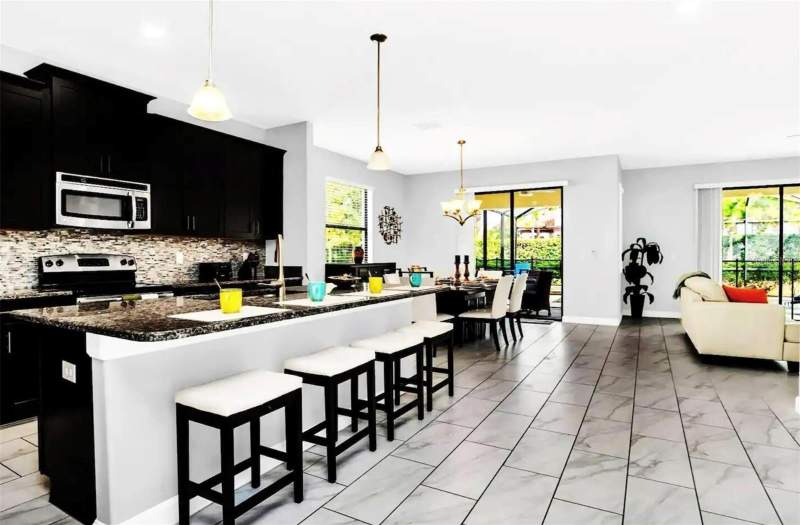 6 bedroom Single Family Residence at 5504 Solterra Circle, Solterra Ph 1, Davenport — photo 5