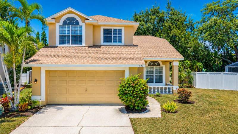 4 bedroom Single Family Residence at 437 BRILAND STREET, GRASSY POINTE - PH 1, TARPON SPRINGS — photo 1