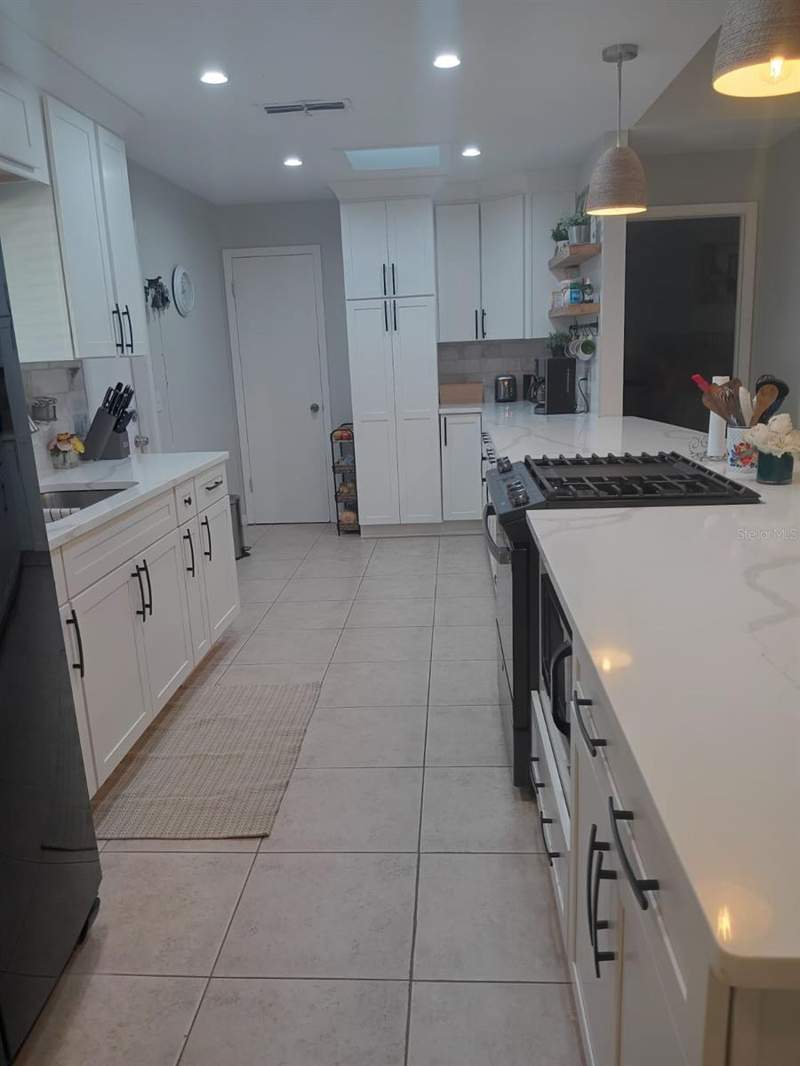 4 bedroom Single Family Residence at 10700 Gardenwood Road, Orangewood Village 09, Orlando — photo 5