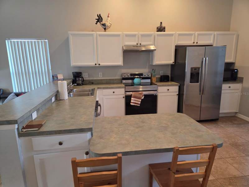 5 bedroom Single Family Residence at 115 Castlemain Circle, Hampton Estates, Davenport — photo 5