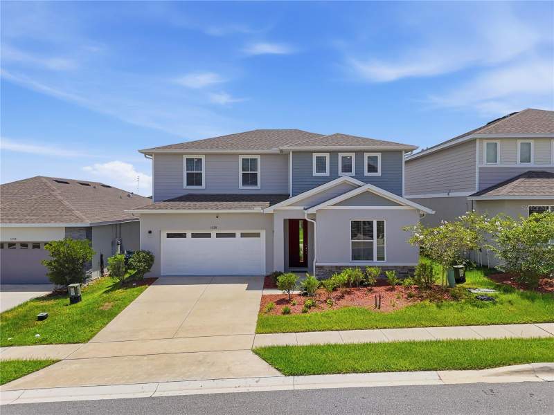5 bedroom Single Family Residence at 1128 SUGARWOOD STREET, FOREST LAKE PH I, DAVENPORT — photo 1
