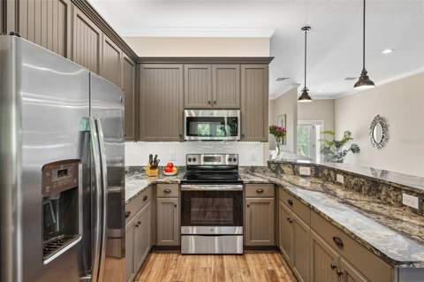 1212 Fiesta Key Circle, Lady Lake FL - photo 12 of 56