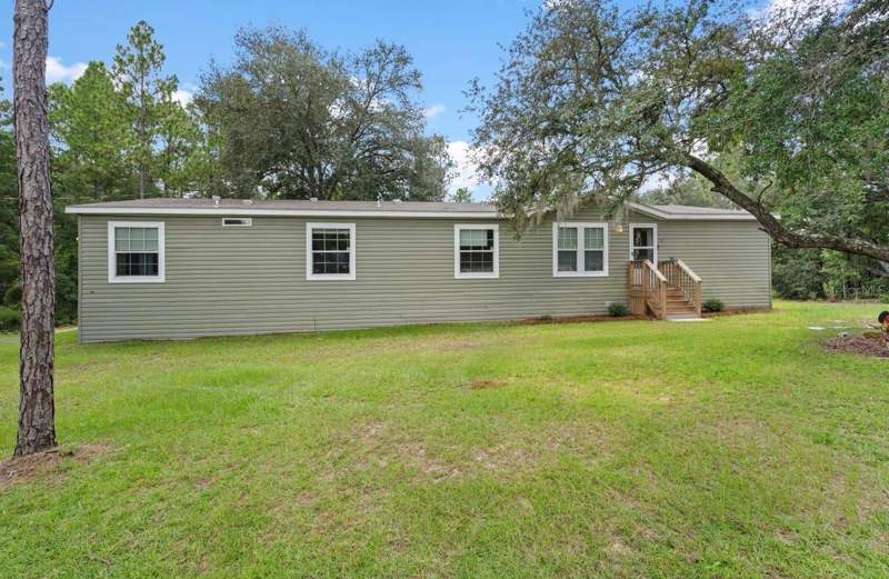 5 bedroom Manufactured Home at 13850 NE 52nd Place, B & R Sub, Williston — photo 1