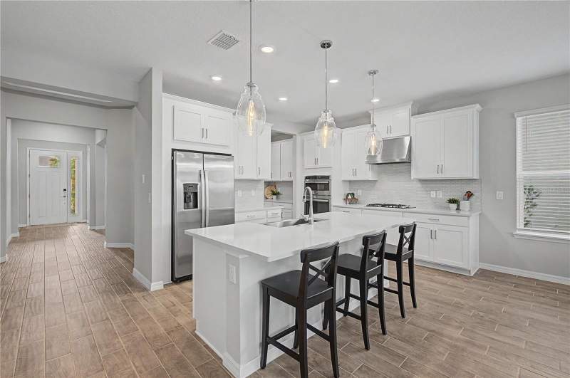 4 bedroom Single Family Residence at 10938 Fieldstone Drive, Artisan Lakes Eaves Bend Ph II Subph A,, Palmetto — photo 2