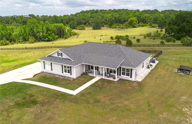 4 bedroom Single Family Residence at 5021 NW 101st Street Road, Equestrian Springs, Ocala — photo 2