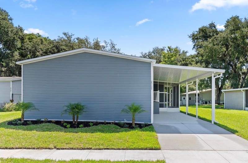 4 bedroom Manufactured Home at 25124 Huckleberry Way, Astatula Meadows Sub, Astatula — photo 3