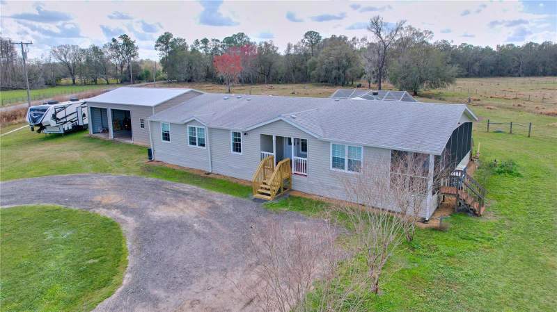 4 bedroom Modular Home at 14890 CR 757, Acreage, Webster — photo 1