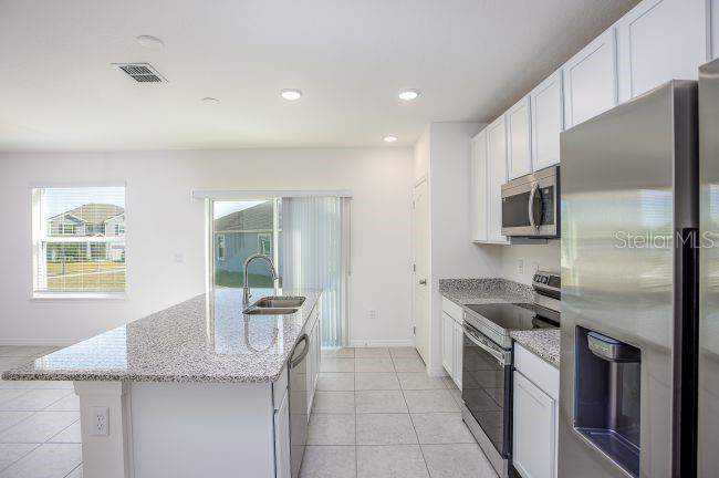 4 bedroom Single Family Residence at 8099 SW 9th Lane, Oakhaven Walk, Gainesville — photo 4