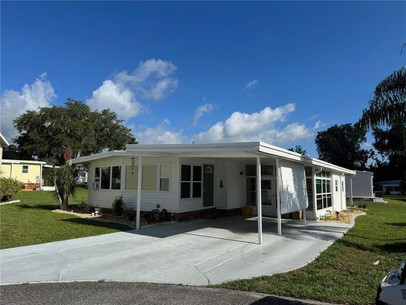 2 bedroom Mobile Home at 102 Tangelo Cove, Hawthorne At Leesburg A Coop, Leesburg — photo 2