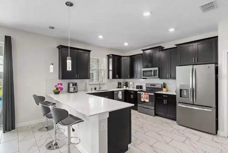7 bedroom Single Family Residence at 913 Ocean Course Avenue, Stoneybrook South North Pcl-Ph, Davenport — photo 5