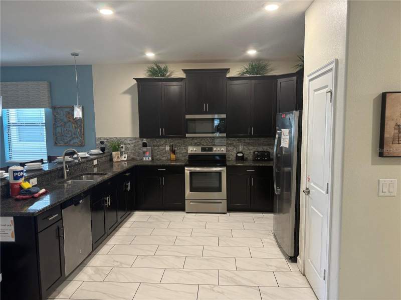 8 bedroom Single Family Residence at 9158 SCRAMBLE DRIVE, STONEYBROOK SOUTH PH G-1, DAVENPORT — photo 5