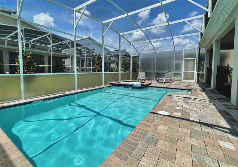 7 bedroom Single Family Residence at 830 Drop Shot Drive, Stoneybrook South North Prcl Ph 3, Davenport — photo 4