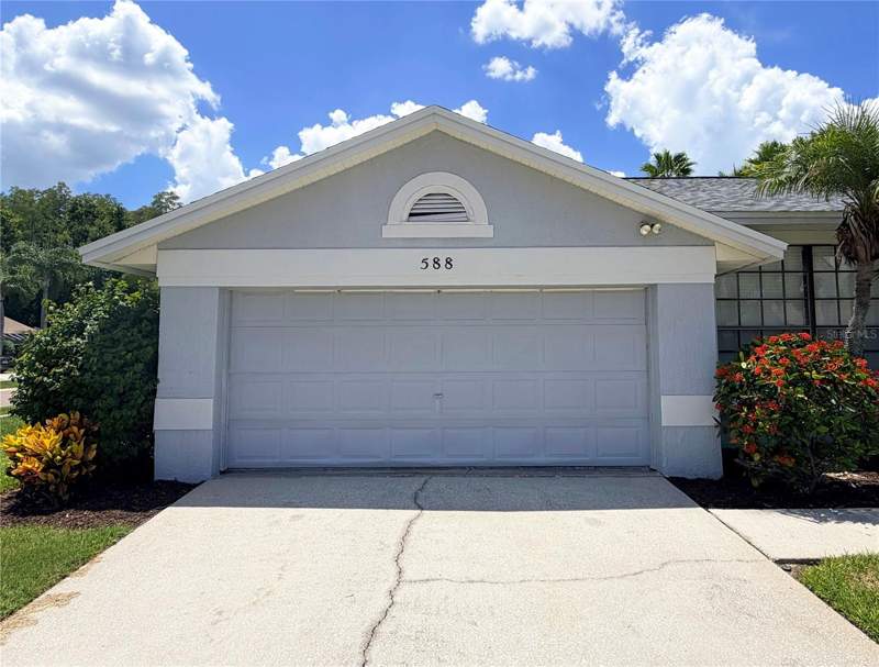 4 bedroom Single Family Residence at 588 Hollowtree Place, Oaklake Village At Woodfield Ph II, Tarpon Springs — photo 2