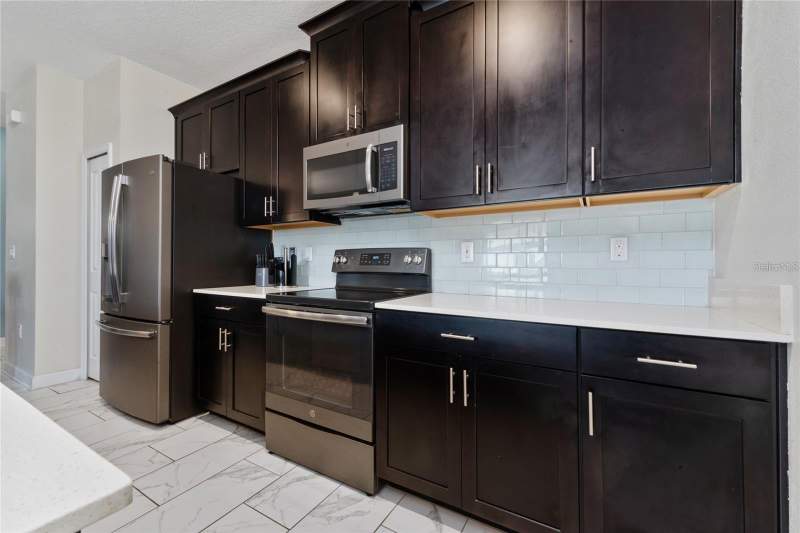 4 bedroom Townhouse at 8932 Stinger Drive, Stoneybrook South Ph J-2 & J-3, Davenport — photo 4