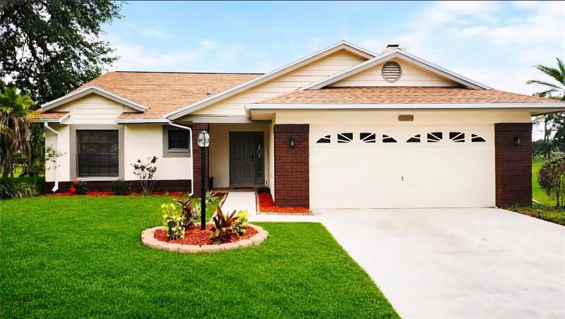 2 bedroom Single Family Residence at 13036 Topflite Court, Wood View At Meadow Oaks, Hudson — photo 1