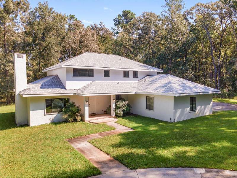 6407 NW 132ND STREET home for sale in Millhopper Road Estates Homes for Sale: 1 Listing, From $525K