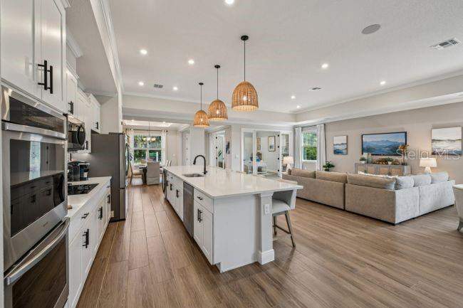 4 bedroom Single Family Residence at Tbd 64th Avenue, Garden City Ph 01C Tr A, Naples — photo 3