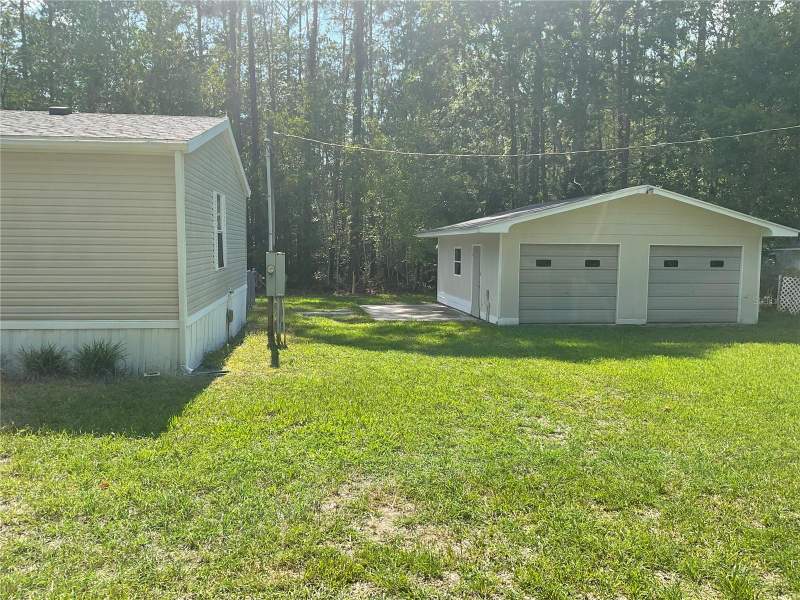 2 bedroom Manufactured Home at 4398 NE 130th Court, Lake Charles Campsites, Silver Springs — photo 4