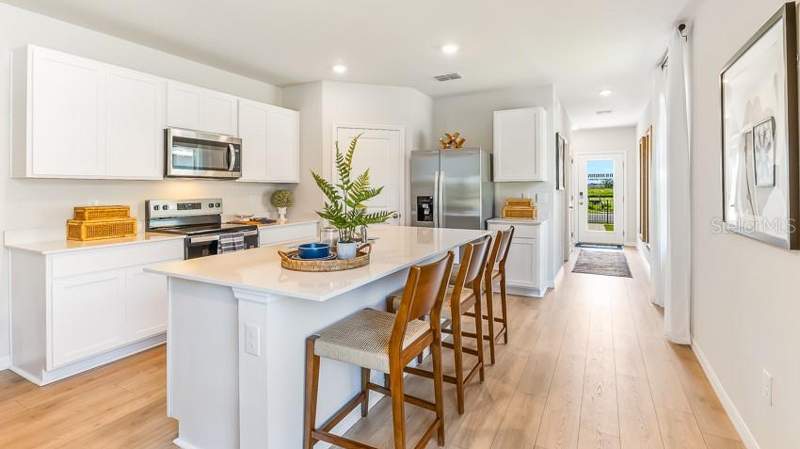 4 bedroom Single Family Residence at 9957 Morning Meadowlark Trail, Oakfield Trails, Parrish — photo 3