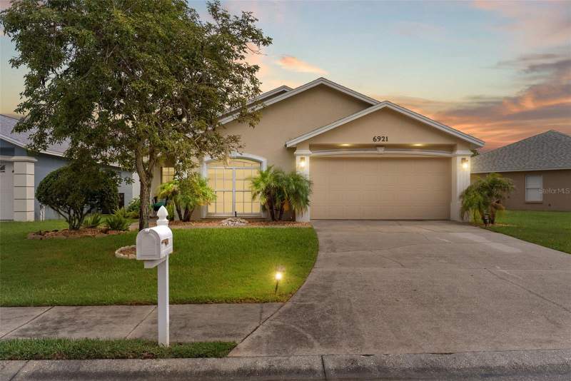 4 bedroom Single Family Residence at 6921 SHIMMERING DRIVE, TWIN LAKES AT CHRISTINA PH 01, LAKELAND — photo 1