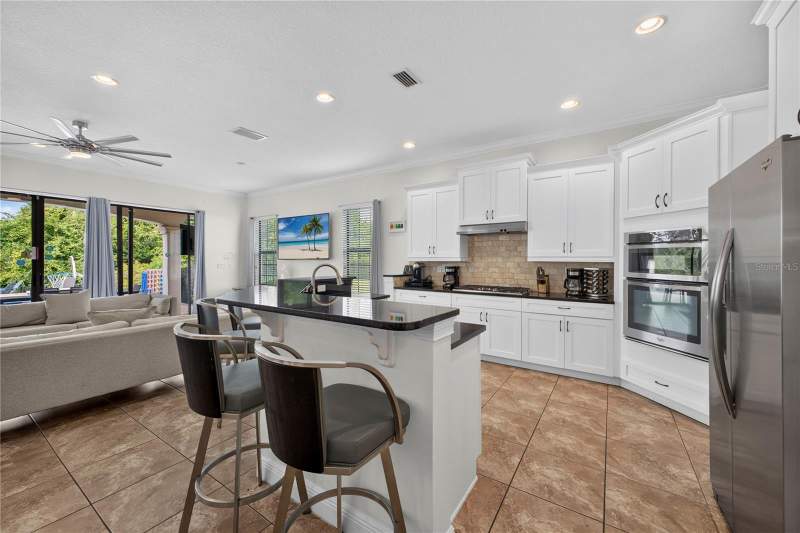 5 bedroom Single Family Residence at 824 Desert Mountain Court, Reunion West Village 3A, Kissimmee — photo 3
